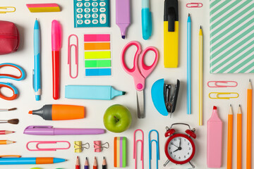 Fototapeta Flat lay with different school supplies on white background obraz