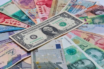 Fototapeta na wymiar US Dollars and other currencies