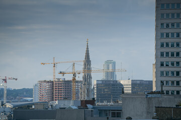 Construction site in Brussels Belgium with the church from Grand Place in background
