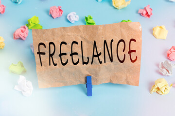 Text sign showing Freelance. Business photo text working at different firms rather than being...