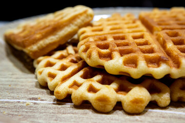Waffles on a wooden plate