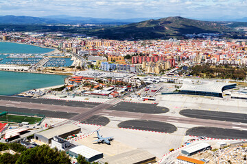 GIBRALTAR, UK - MAY 1, 2017: Gibraltar airport runway and La Linea de la Concepcion in Spain,...