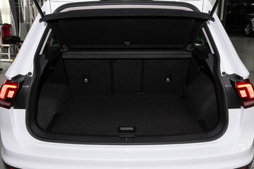 Rear view of a car with an open trunk. Exterior of a modern car.