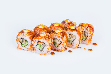 Japanese Crunchy Sushi Roll with eel and cucumber isolated on gray background. Asian dish with japanese mayonnaise on top served with Unagi sauce. Single object
