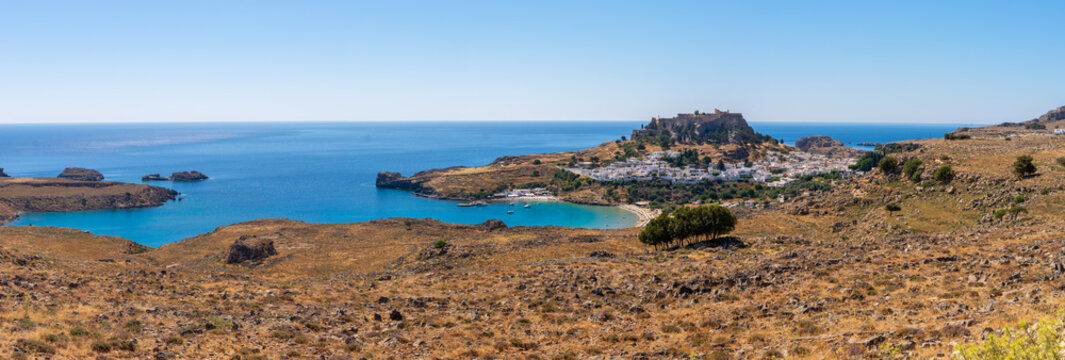 Sea bay and the village of Lindos with the Acropolis on the hill.Rhodes, island, reece