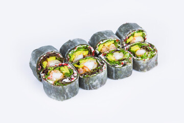 Japanese Sushi Roll wrapped in daikon radish. Asian dish without rice isolation on gray background. Roll pieces with salad leaves, tobiko caviar (flying fish roe), tempura shrimp, avocado. 
