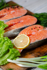 red fish steak with herbs, spices and lemon