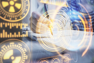 Fototapeta premium Tech theme hologram over woman's hands taking notes background. Concept of hightech. Double exposure