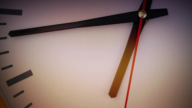 Clock face with black and red pointers close up