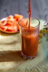 freshly squeezed carrot juice on the table