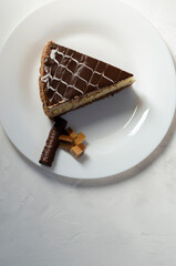 Napoleon cake on a table with sweets