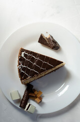 Napoleon cake on a table with sweets