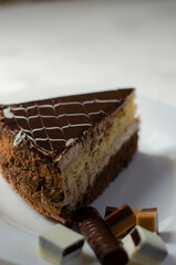 Napoleon cake on a table with sweets