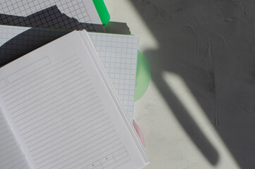 note book with markers on white background