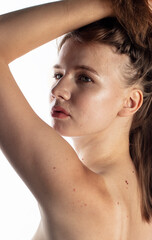 Naklejka premium photo of a naked girl, topless, studio shooting