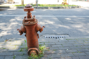 Old fire hydrant on the pavement