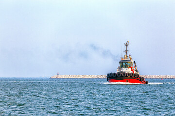 MERSIN, TURKEY - AUGUST 01, 2018: View of the tugboat or towboat of Mersin International Port. A...