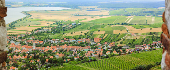 beautiful czech landscape wiht country, grass, watter and houses