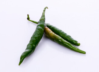 Green chili pepper. Isolated on Dark background.