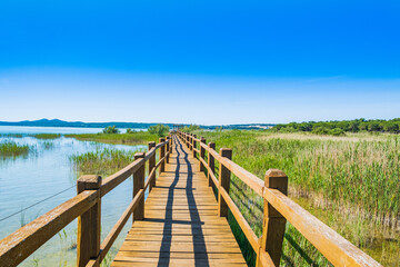 Fototapeta premium Nature park Vrana lake (Vransko jezero), Dalmatia, Croatia, wooden path in observation park