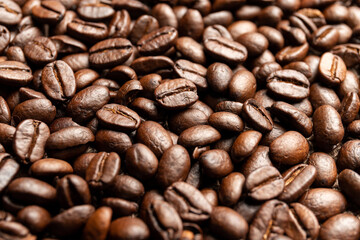 Roasted coffee beans on sackcloth.