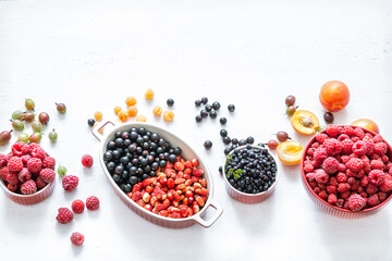 Composition with a variety of fresh berries and fruits