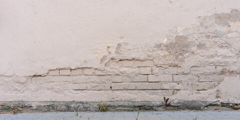 wide brick white wall with abandoned old plaster background