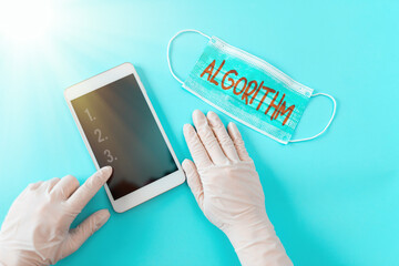 Writing note showing Algorithm. Business concept for a method or set of rules for calculations or other problem solving Contaminated electronic gadgets controlled by disinfectant