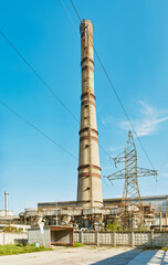 Obraz premium Panoramic view of a thermal power plant on a spring morning.