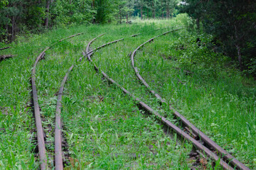 Railroad for a train in the grass. abandoned railway