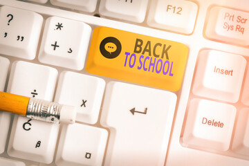 Text sign showing Back To School. Business photo text is the period relating to the start of a new school year Different colored keyboard key with accessories arranged on empty copy space