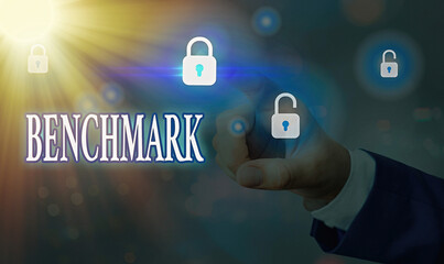 Handwriting text writing Benchmark. Conceptual photo a reference point against which items can be measured or evaluated Graphics padlock for web data information security application system