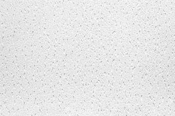Plaster or cast material. Close up of a white background or texture. Irregular surface with grey...