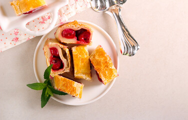 Cherry filling pastry roll, sliced
