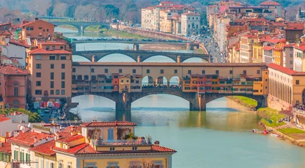 Wall murals Ponte Vecchio Ponte Vecchio over Arno river in Florence, Italy