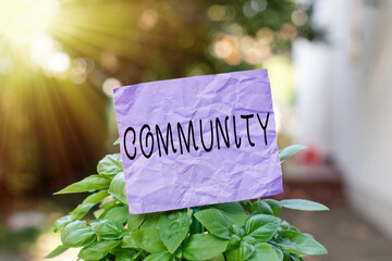 Text sign showing Community. Business photo showcasing group of showing living in one place having...