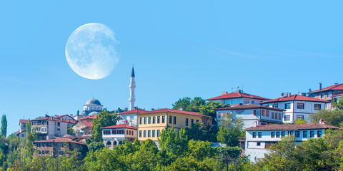 Traditional ottoman houses with full moon - Safranbolu, Turkey "Elements of this image furnished by NASA"