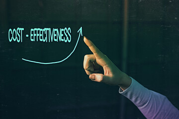 Conceptual hand writing showing Costeffectiveness. Concept meaning produce good results without...