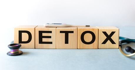 Detox word written In the wooden cubes. Medicine concept