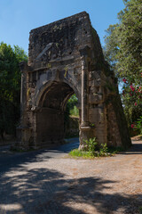 Fototapeta na wymiar The Arch of Drusus is not a triumphal arch but an element of the Antonian aqueduct which fed the Terme of Caracalla. It is located at the entrance of the ancient Appian way, Appia antica, Rome, Italy.