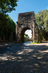 Fototapeta na wymiar The Arch of Drusus is not a triumphal arch but an element of the Antonian aqueduct which fed the Terme of Caracalla. It is located at the entrance of the ancient Appian way, Appia antica, Rome, Italy.