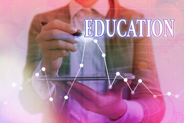 Writing note showing Education. Business concept for the process of obtaining or giving systematic...