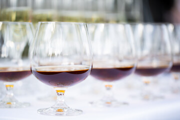Glasses of alcohol close- up before a party in a cafe