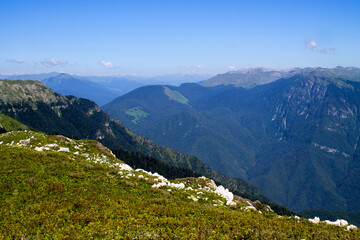 Summer landscape in the mountains and dark blue sky with clouds