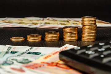 russian money coins and paper rubles lying on the table