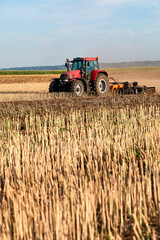 tractor tillage in rapeseed field