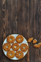 Homemade cookies or rings with crushed peanuts. Flour product