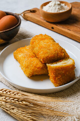 Delicious Risoles or Risol Mayo is a typical Indonesian traditional street food made from flour skin, meat and vegetables stuffing inside with mayonnaise and chili sauce.