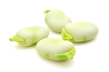close up of fresh broad beans on white background