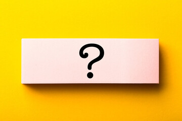 Question Mark Paper Isolated On Yellow Background